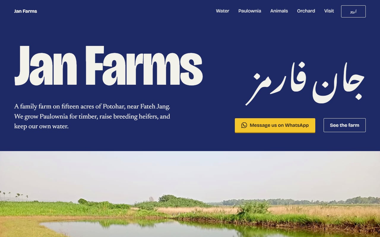 Home page of the Jan Farms website, with the farm name in English and Urdu above a photograph of the dam